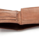 Empty brown leather wallet. Studio isolated on white with light shadow. Shallow depth of field.